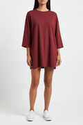 Wine red oversized t-shirt - full body studio shot showing relaxed fit
